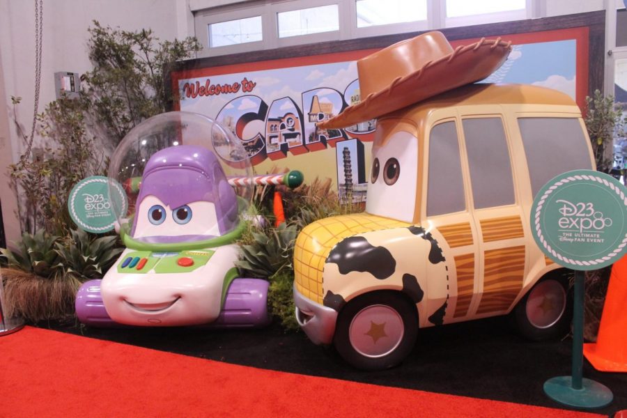 Models of woody and buzz in car form. This leads to tables outside the expo. Photo credit: Oscar Torres
