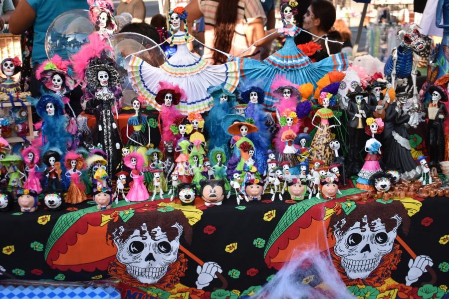 Display of Day of the Dead Art being sold. The bright colors used are common during the Day of the Dead celebration. 