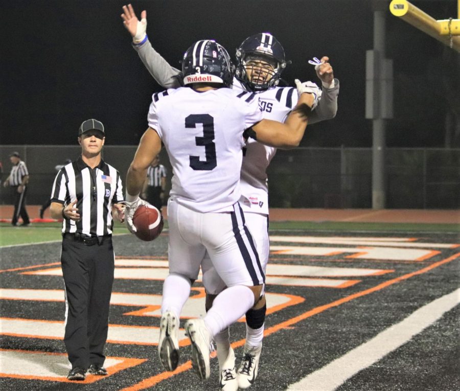 Hinckley Ropati, No. 3, celebrates his third rushing touchdown with teammate Jovohn Hardy No.6  late in the fourth. The Falcons defeated the Ventura Pirates on Nov. 23, 2019. Photo credit: Anthony Saldana