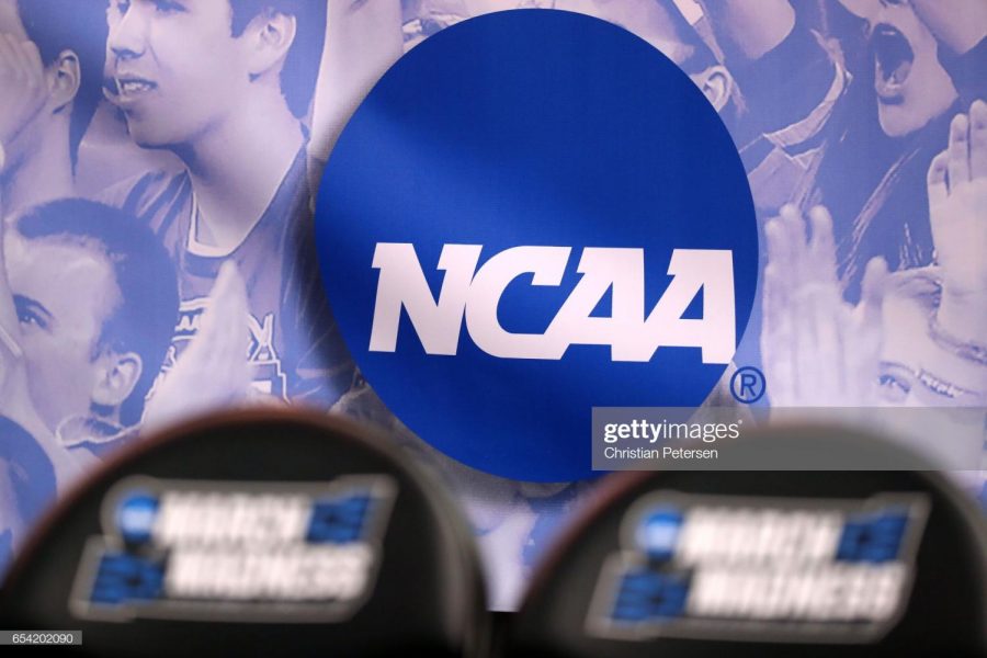 SALT LAKE CITY, UT - MARCH 16: The NCAA logo is seen in the second half of the game between the Northwestern Wildcats and the Vanderbilt Commodores during the first round of the 2017 NCAA Men's Basketball Tournament at Vivint Smart Home Arena on March 16, 2017 in Salt Lake City, Utah