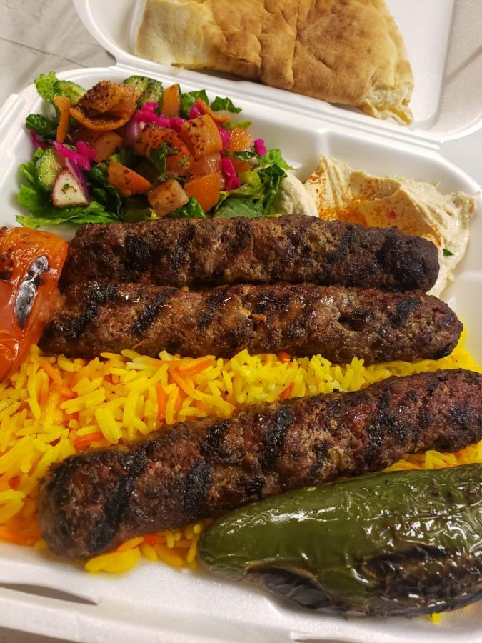 Beef Kafta plate with a delicious house salad and yellow jasmine rice to tie-in everything together. 