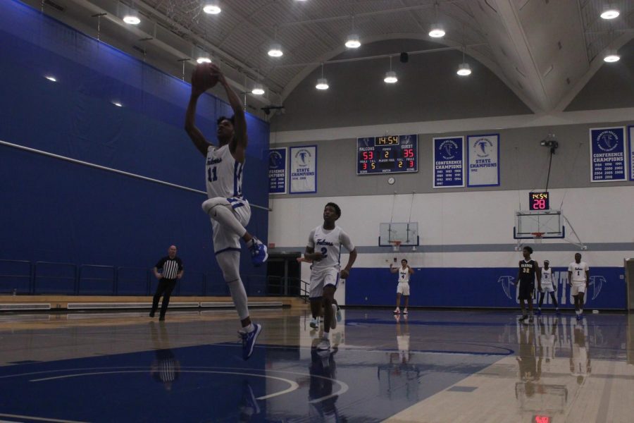 Falcons forward No. 11, Jaishon Forte, steals the ball from a Cougar player and dunks it at the end of the play. Cerritos mens basketball played LA Harbor college on Feb.7, 2020. Photo credit: Keanu Ruffo