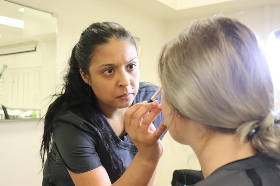 Stephanie Mora, a cosmetology student at Cerritos, practicing hands-on before Cerritos College closed due to COVID-19, March 13. 