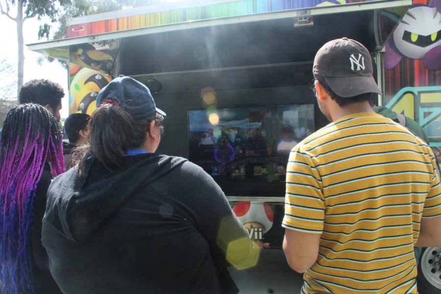 A couple of students stopped by the game truck to play a bit of smash bros with each other. Everyone was having a blast with how chaotic the game was on March 11, 2020. Photo credit: Oscar Torres