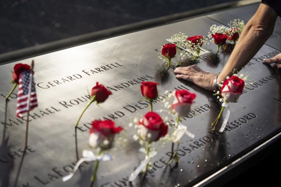 Roses laid out in memory of Sept. 11 victims. Family members gathered to honor their loved ones on the 19th anniversary of the attacks. Photo credit: Ben Hider &  9/11 Memorial & Museum