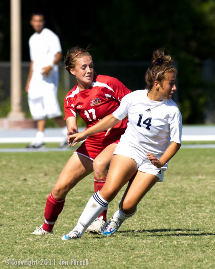 Players from Pima Community College and Mesa Community College battle it out to help their team win in conference play. Junior college athletes are given an extra year of eligibility to play the sport they're in after NJCAA passed blanket waiver. Photo credit: Jim Purcell