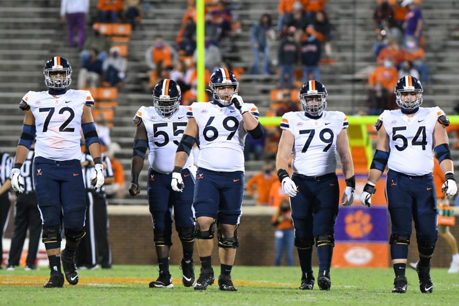 CLEMSON, SC - OCTOBER 03: The Virginia Cavaliers offensive linemen make their way down field during the game between the Clemson Tigers and the Virginia Cavaliers on October 03, 2020 at Memorial Stadium in Clemson, South Carolina. (Photo by Dannie Walls/Icon Sportswire) Photo credit: Photo by Dannie Walls/Icon Sportswire