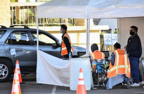Testing site staff keep track of how many patients are coming to receive their test on Nov. 10 at Bellflower City Hall. People who show Coronavirus symptoms are encouraged to get a free test through LA County.