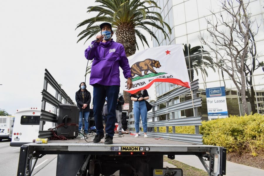 SEIU Labor Organizer, Felipe Caceres, gives a powerful speech to the pro-immigration caravan. SEIU and several other organizations called for immigration reform during the caravan at LAX on Jan. 27. 