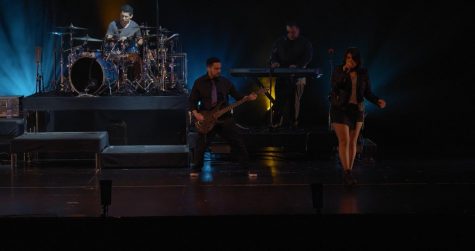 Taken on February 2, 2019 at the Cerritos Burnight Theatre, the band is seen here performing a song off of their second album, Singularity. Pictured (left to right): Mikey Enriquez, Joel Alvarez, Professor Maz and Emili Romano.