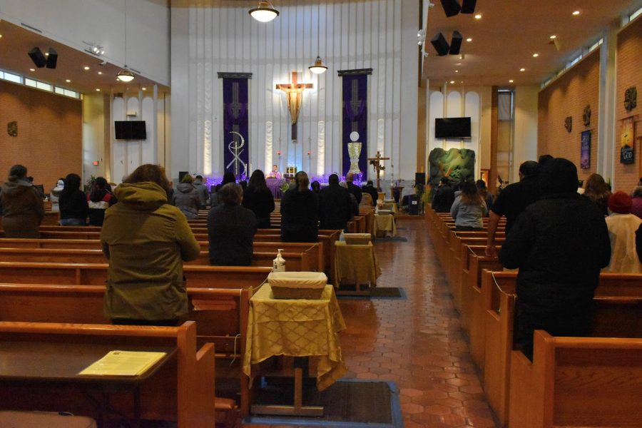 Saint John of God church in Norwalk held an indoor service on Feb. 17, 2021. The audience is required to social distance and wear a mask. 