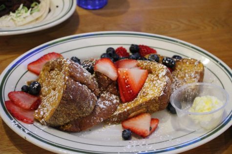 Waitress sets down Momo's the french toast mama's style on Feb 20.