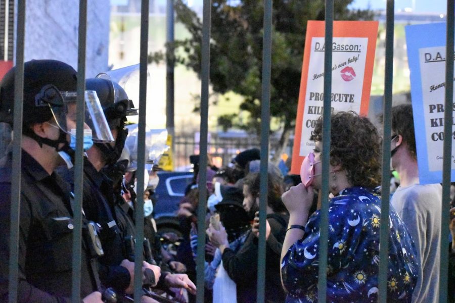 LAPD follow a peaceful Women's Day protest on March 8, 2021. Their presence aggravates the demonstrators and leads to a stand-off on Spring St. 