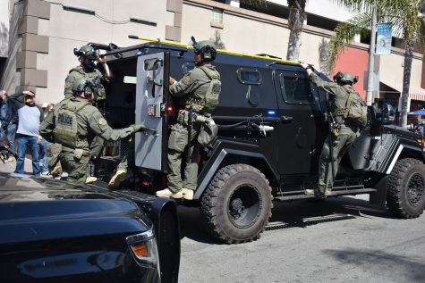 HBPD SWAT rolls away from the "unlawful assembly" they just threatened to disperse. Police leaving the scene seemed to diffuse tensions on April 11, 2021.