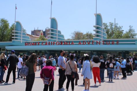 California Adventure Park hosts another day of the Touch of Disney ticketed event. Hundreds of people wait in line to enter inside the park on April 19.