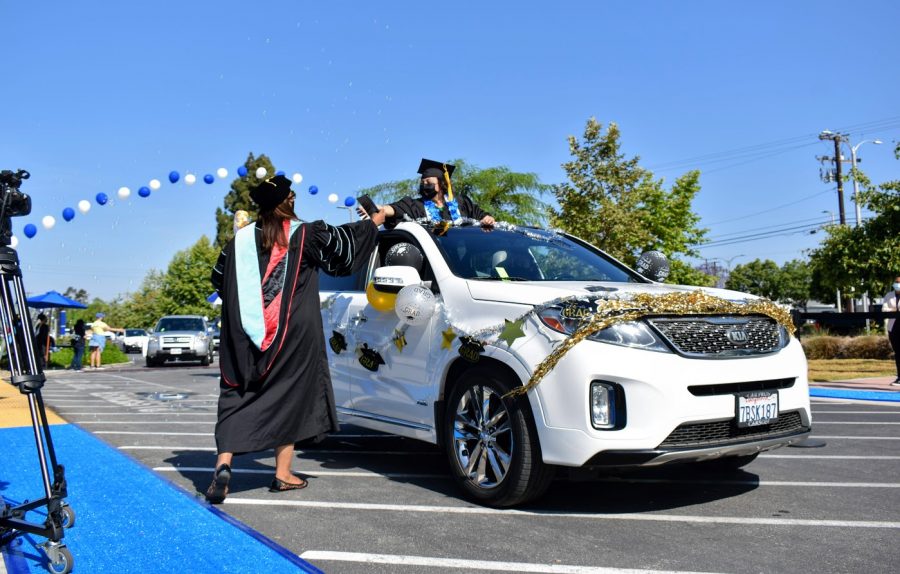 Cerritos College graduating class of 2021 celebrated their achievements with a socially-distance commencement ceremony on May 28, 2021. Many students decorated their cars with streamers and stickers. 