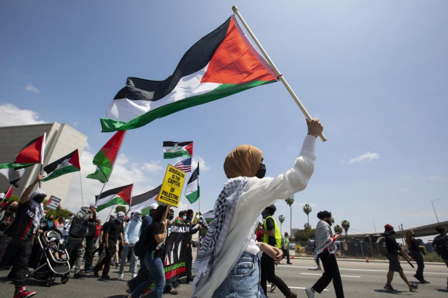 Tension between Israel and the Palestinians increased last week sparking worldwide outrage. People at a Palestinian Rally/Protest on May 15 in Los Angeles demand Palestine be free from violence and oppression.
