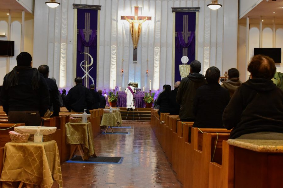 The Archdiocese of Los Angeles recommends that all eligible people receive the COVID-19 vaccine. The Saint John of God Church holds an indoor Ash Wednesday sermon on Feb. 17, 2021. 