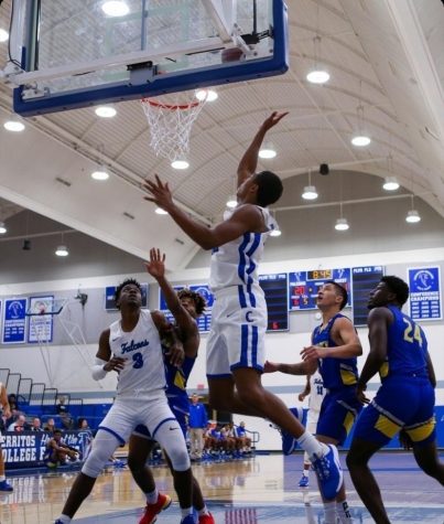 Jahlen on the right going up for a layup.