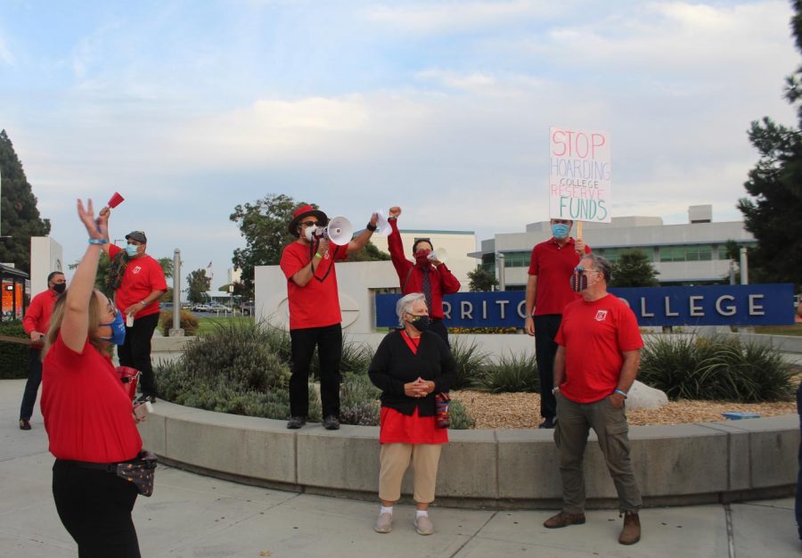 Cerritos+college+faculty+and+staff+picket+on+the+corner+of+Alondra+and+Studebaker+during+contract+negotiations+with+the+college+on+Oct.+6%2C+2021.+The+district+wants+to+implement+a+CAP+on+healthcare+plans+that+will+increase+premiums+raising+the+costs+for+full-time+employees.