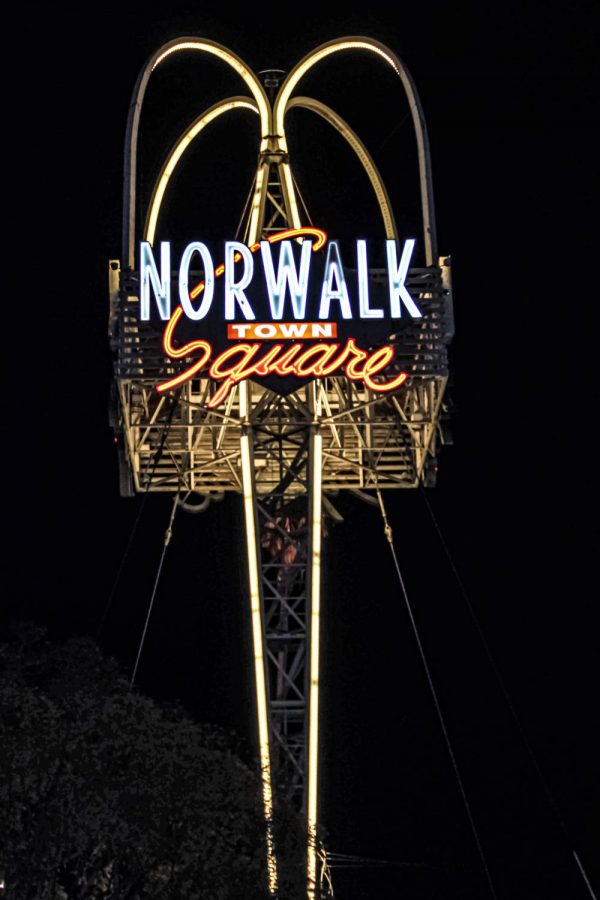 Norwalk+Town+Square+sign+that+stands+tall+in+the+city+of+Norwalk.+The+sign+lights+up+in+the+night+as+it+displays+in+the+center+of+the+Norwalk+Community+on+April.+26th%2C+2020+