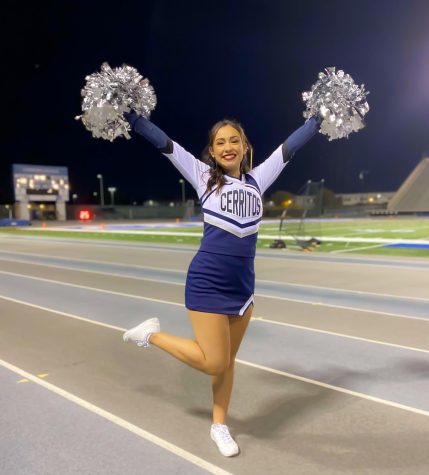 Abigail Covarrubias, 20, is grateful to be back at Falcon Stadium cheering as Cerritos Sports resumes action after an entire season away due to COVID-19. Abigail is excited to be back under the lights on Saturday nights cheering on for the Falcons Football team. Photo Credit: Courtesy of Abigail Covarrubias