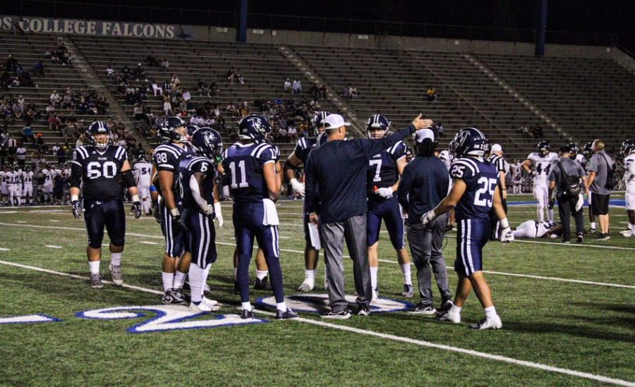 Before the football team was shut down on September 24. The coach is seen orientating his players on the field September 11. 