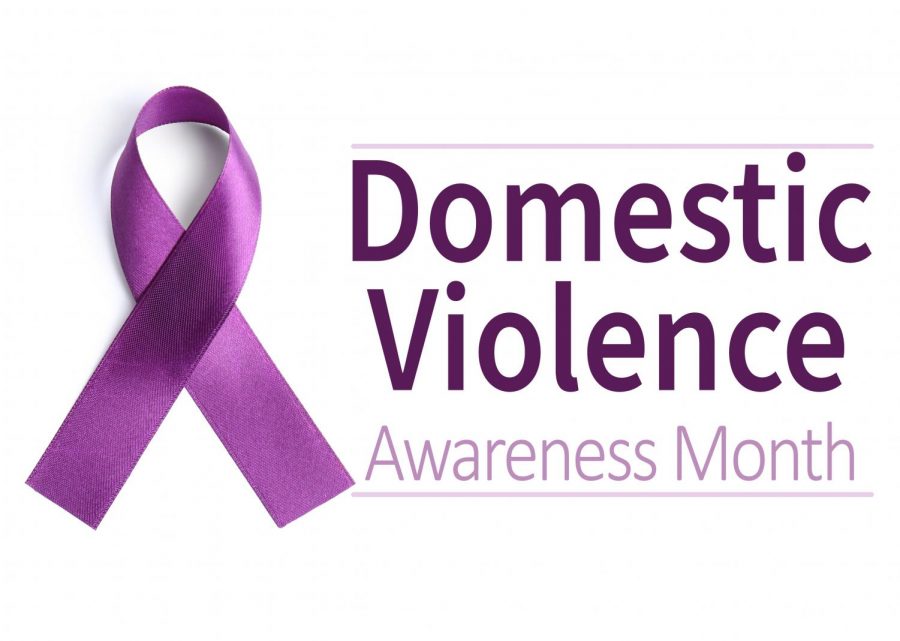 Purple ribbon on white background, top view. Symbol of Domestic Violence Awareness Photo credit: Copyright: Belchonock/@123RF.com
