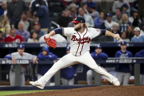 In this photo from October 23, 2021, Atlanta Braves relief pitcher A.J. Minter works during the fifth inning against the Los Angeles Dodgers in Game 6 of the National League Championship Series at Truist Park in Atlanta. The Braves move on the World Series with a 4-2 win over the Dodgers, who have a plethora of decisions to make in their earlier than expected offseason. (Robert Gauthier/Los Angeles Times/TNS)
