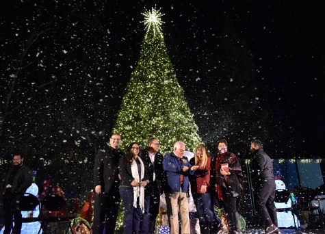 Norwalk city council lights the city hall Christmas tree. Snow reigned down on the audience during the celebration on Dec. 4, 2021.