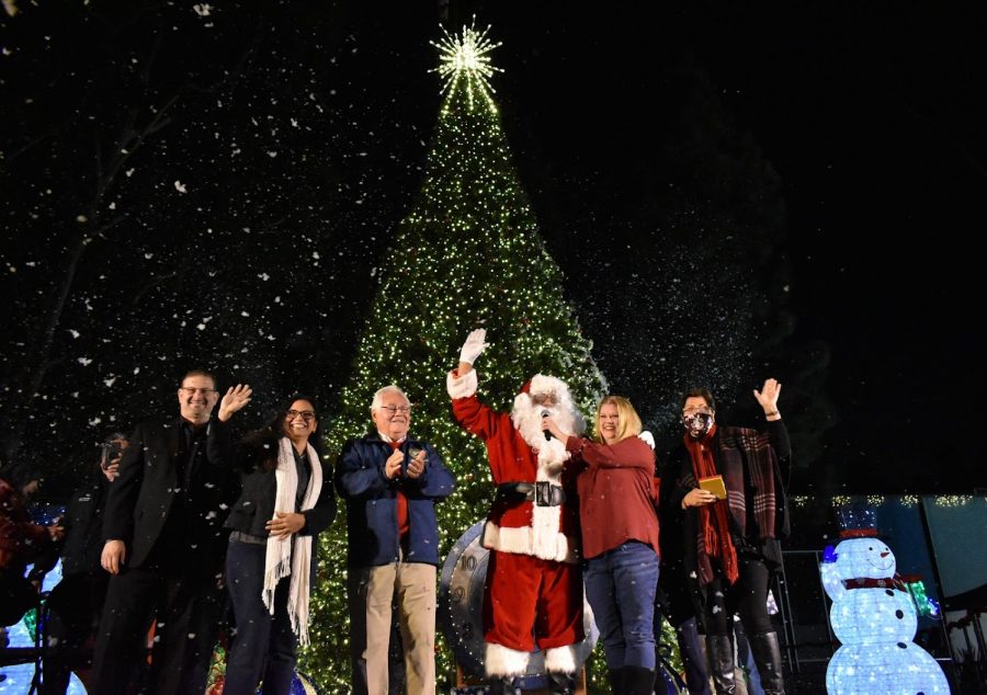 Norwalk+city+council+celebrates+the+return+of+the+annual+Christmas+tree+lighting+ceremony.+They+welcome+Santa+Clause+to+the+celebration+on+Dec.+4%2C+2021.+