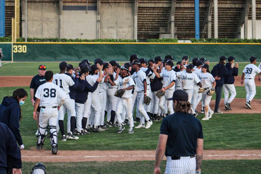 Cerritos+Falcons+take+to+the+field+and+celebrate+the+7-4+win+against+Irvine+Valley+after+closing+out+the+top+of+the+ninth+inning.+The+Falcons+win+their+first+home+game+and+second+of+the+season+on+Thursday%2C+Feb.+3%2C+2022.+Photo+credit%3A+Roman+Acosta