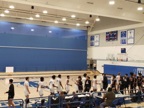 Cerritos Falcons lost in a heart crusher against Long Beach City 71-58 (which took place Feb. 11, 2022). Both teams give high fives and say good game to the opposition. 