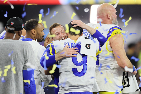 INGLEWOOD, CALIFORNIA - FEBRUARY 13: Head coach Sean McVay of the Los Angeles Rams and Matthew Stafford #9 celebrate after Super Bowl LVI at SoFi Stadium on February 13, 2022 in Inglewood, California. The Los Angeles Rams defeated the Cincinnati Bengals 23-20.  (Photo by Andy Lyons/Getty Images)