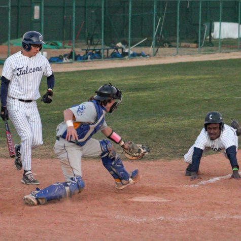 Bilal Ali slides home tied at 5-5, with two outs against the Seahawks in the bottom of the ninth. He would be called out at the plate by the umpire to end regulation on Feb. 24, 2022