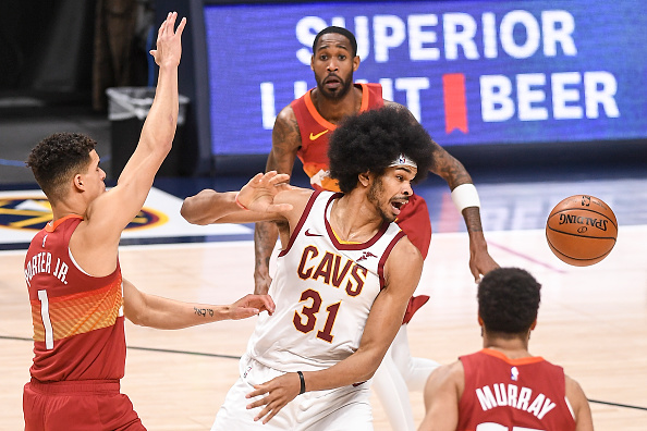 DENVER, CO - FEBRUARY 10: Jarrett Allen (31) of the Cleveland Cavaliers eyeballs a loose ball as Michael Porter Jr. (1) of the Denver Nuggets, Will Barton (5) and Jamal Murray (27) defend during the third quarter at Ball Arena on Wednesday, February 10, 2021. (Photo by AAron Ontiveroz/MediaNews Group/The Denver Post via Getty Images)