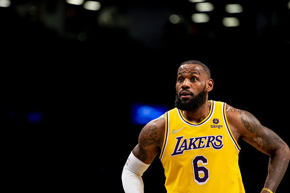 NEW YORK, NEW YORK - JANUARY 25: LeBron James #6 of Los Angeles Lakers reacts during action against the Brooklyn Nets at Barclays Center on January 25, 2022 in the Brooklyn borough of New York City. NOTE TO USER: User expressly acknowledges and agrees that, by downloading and or using this photograph, User is consenting to the terms and conditions of the Getty Images License Agreement. (Photo by Michelle Farsi/Getty Images)