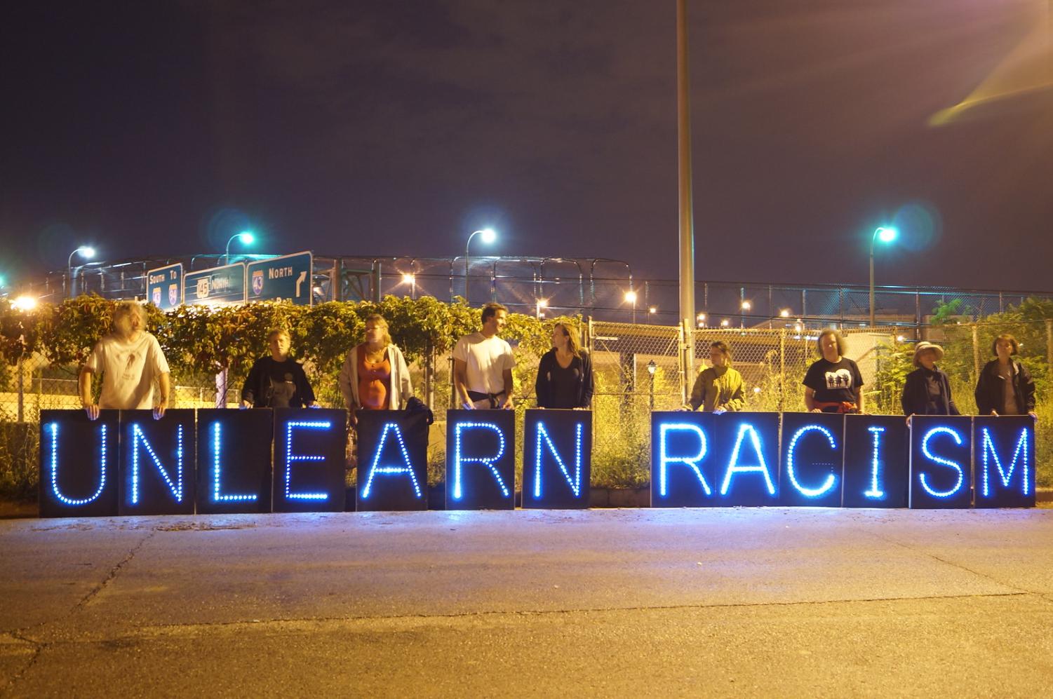 This is an image of people who were protesting the death of Trayvon Martin with this amazing-looking sign. This took place in downtown Milwaukee and the image was taken on June 17, 2012. (Creative Commons) Photo credit: Overpass Light Brigade