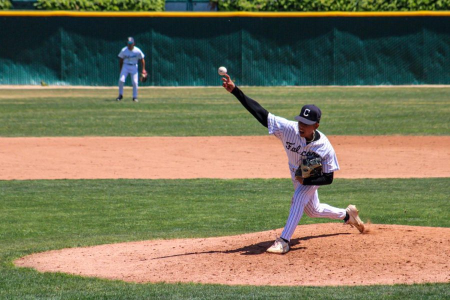 No. 12, Justin Almeda, throws a fastball down the middle in the top of the ninth inning against the Roadrunners. He is credited for the win as the Falcons hold Rio Hondo to only a run on Saturday, April. 23, 2022. 