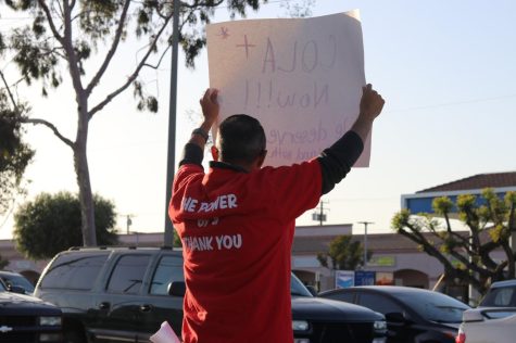 Approximately 100 faculty, staff and students stood at four corners and waved posters, chanted and spread awareness on COLA for Cerritos College.