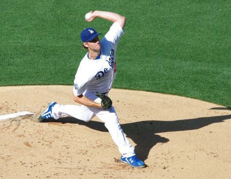 Clayton pitching in a game at Dodger Stadium. Photo credit: Clayton Kershaw, MVP by kla4067 is marked with CC BY 2.0.