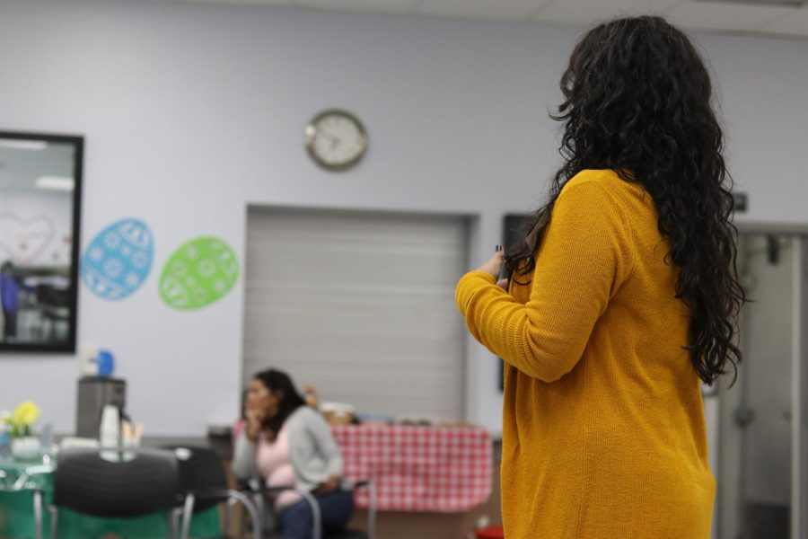 A series of ice breakers, power point presentations, a mini raffle and a Q & A session were hosted by social service workers Jessica and Denise at the meeting. Photo credit: Clarissa Arceo