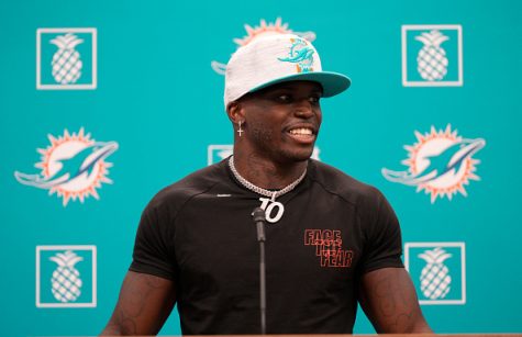 MIAMI GARDENS, FLORIDA - MARCH 24: Tyreek Hill speaks with the media after being introduced by the Miami Dolphins at Baptist Health Training Complex on March 24, 2022 in Miami Gardens, Florida. (Photo by Mark Brown/Getty Images)