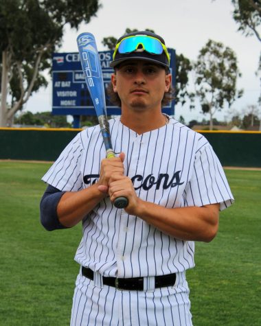 Sophomore catcher, No. 3, Alex Bueno poses with his bat at Kincaid Field after playing LBCC on March. 31, 2022