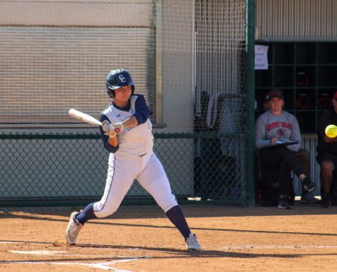 Third baseman, No. 3, Brooklyn Bedolla swings on a ball in the bottom of the third inning. Bedolla unsure before her home run cleared the fence jogs to first with Najera at second waiting to tag up.