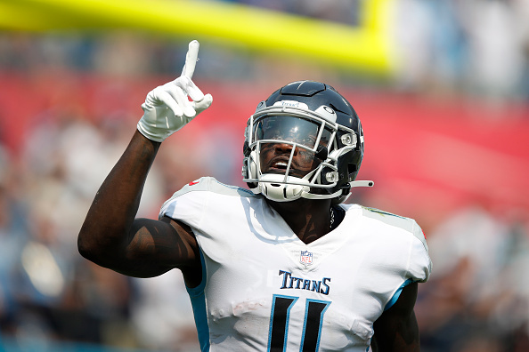 NASHVILLE, TENNESSEE - SEPTEMBER 12: A.J. Brown #11 of the Tennessee Titans celebrates after his touchdown catch against the Arizona Cardinals during the third quarter at Nissan Stadium on September 12, 2021 in Nashville, Tennessee. (Photo by Wesley Hitt/Getty Images)