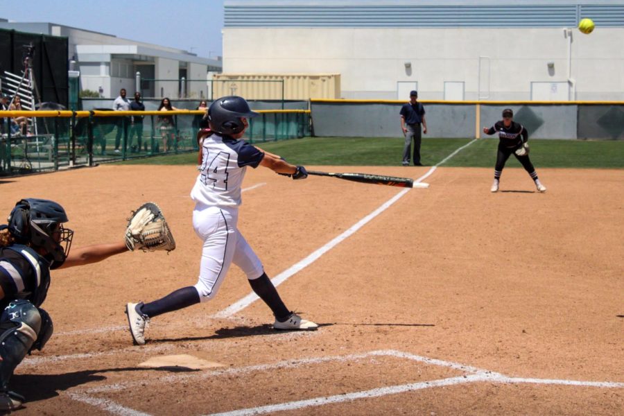 Alyssa Sotelo smashes the ball to deep center field over the wall for a solo home run in the bottom of the fourth inning against the Eagles. Sotelo finishes the game with two runs to help secure the victory for the Falcons against LAMC in game two on May. 7, 2022. Photo credit: Roman Acosta