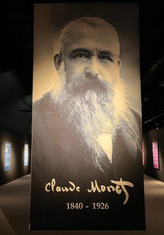 This is the first room of the June 13th Claude Monet Exhibit. As you can see, there is a huge picture of Claude Monet and around that are facts about Monets life. 