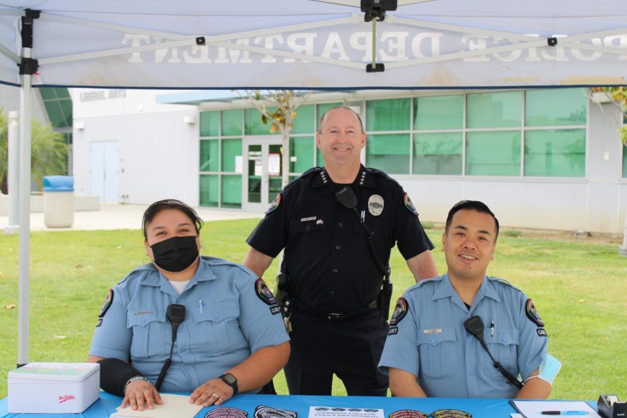 This is a photo of the Cerritos Campus Police Chief Don Meuller with two police officers during the job fair, which took place on May 3. 