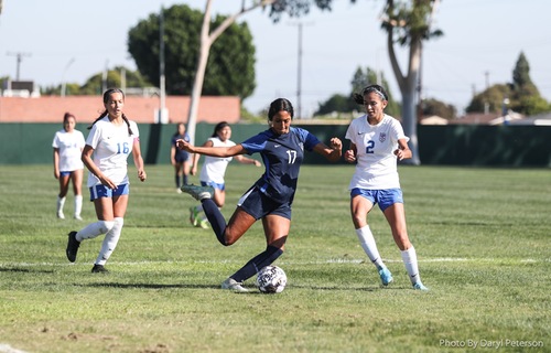 Cerritos defender Aida Pineda outmaneuvers LACC players during the Oct. 21 game. 